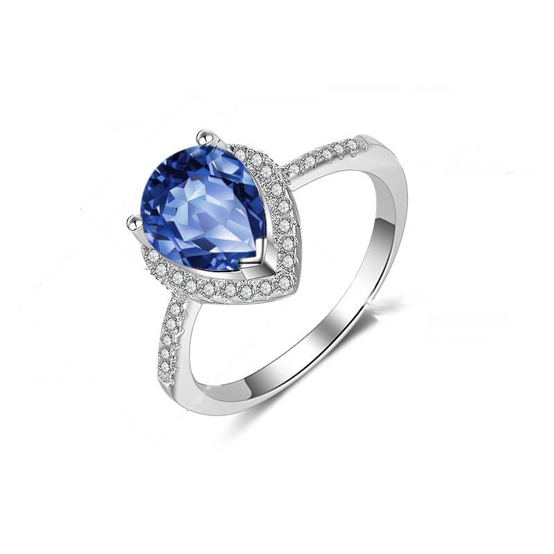 Ring mit blauem oder weißem Stein